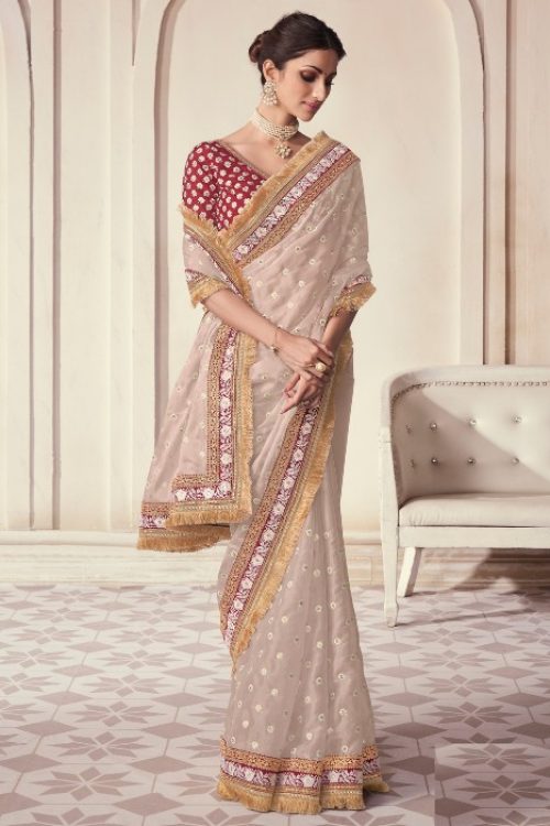 Off White Organza Saree with Maroon Silk Blouse